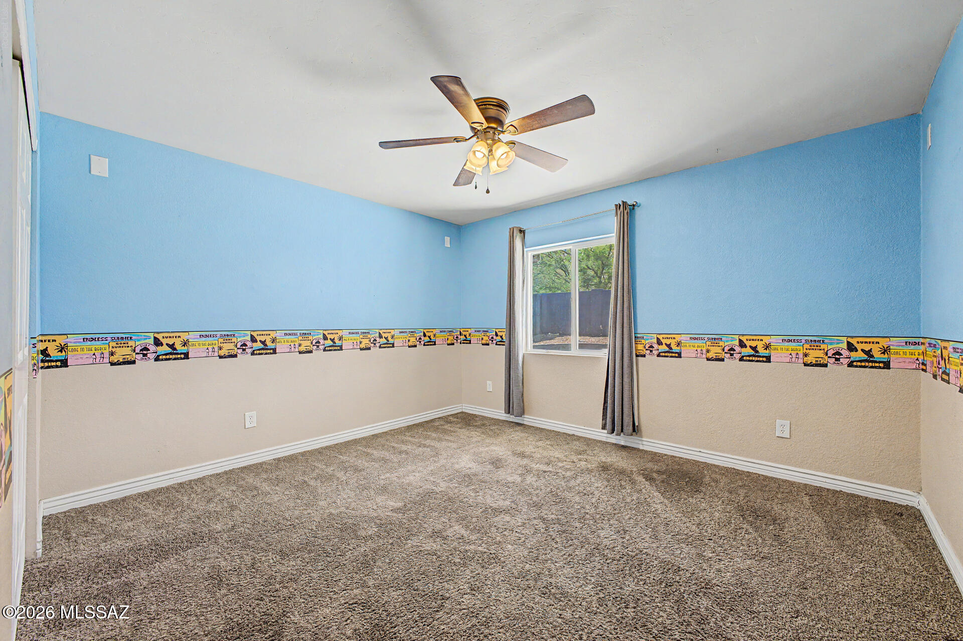 7550 East Rio Verde Drive Tucson, AZ 85715 - Photo 17 of 25 This fun and creative bedroom brings personality & charm with its custom surf-inspired design.