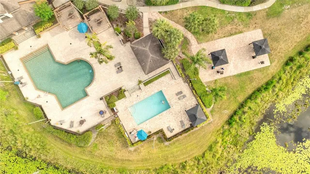 a view of a patio with a yard