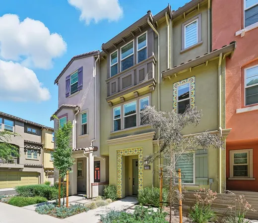 a front view of a multi story residential apartment building