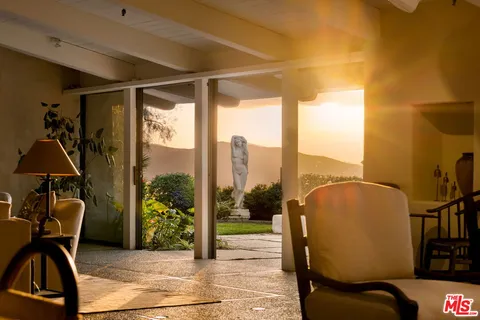 a view of a outdoor space with furniture