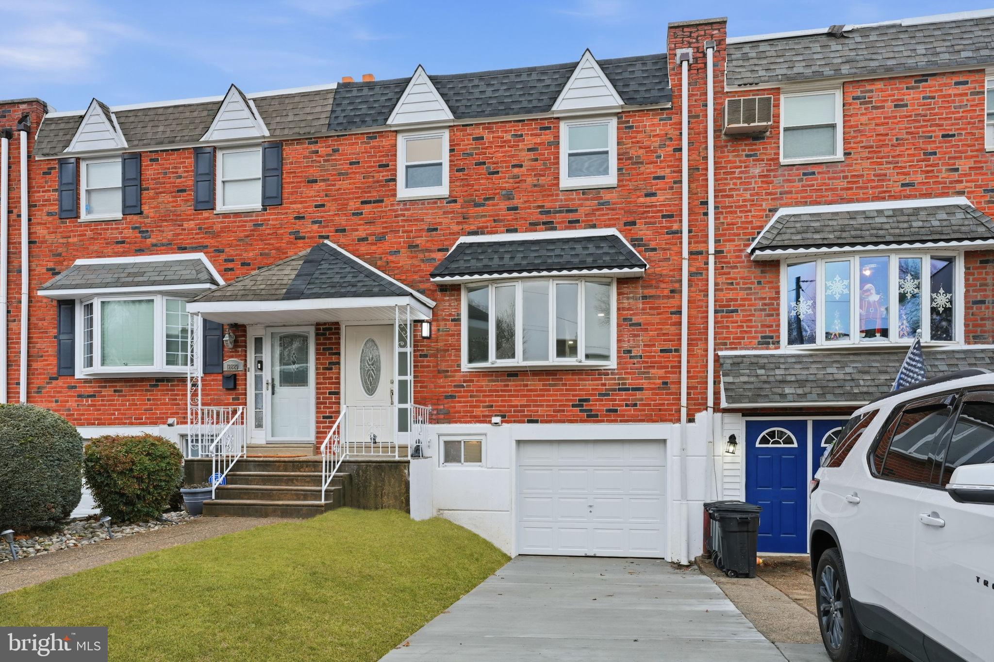 12827 Elnora Road Philadelphia, PA 19154 - Photo 25 of 36 Charming brick townhouse with inviting entrance.