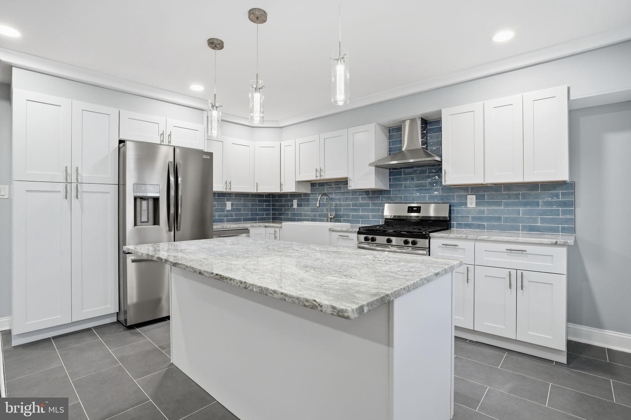 12827 Elnora Road Philadelphia, PA 19154 - Photo 8 of 36 Modern kitchen with sleek design elements.