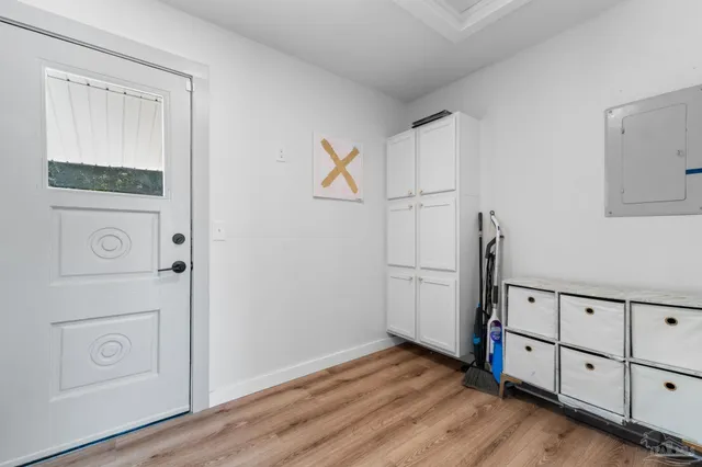 a view of a hallway with closet