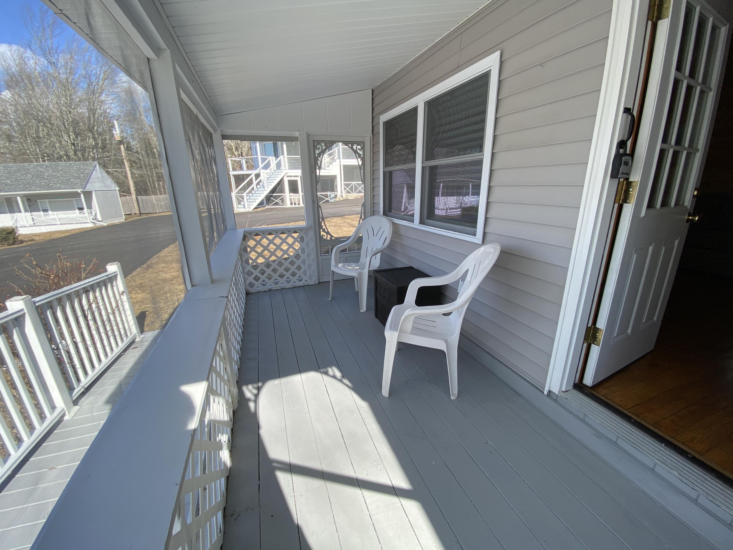 12 Wave Crest Lane, Unit C2 Boothbay, ME 04544 - Photo 21 of 31 Screened porch_Photo Feb 28, 11 32 32 AM