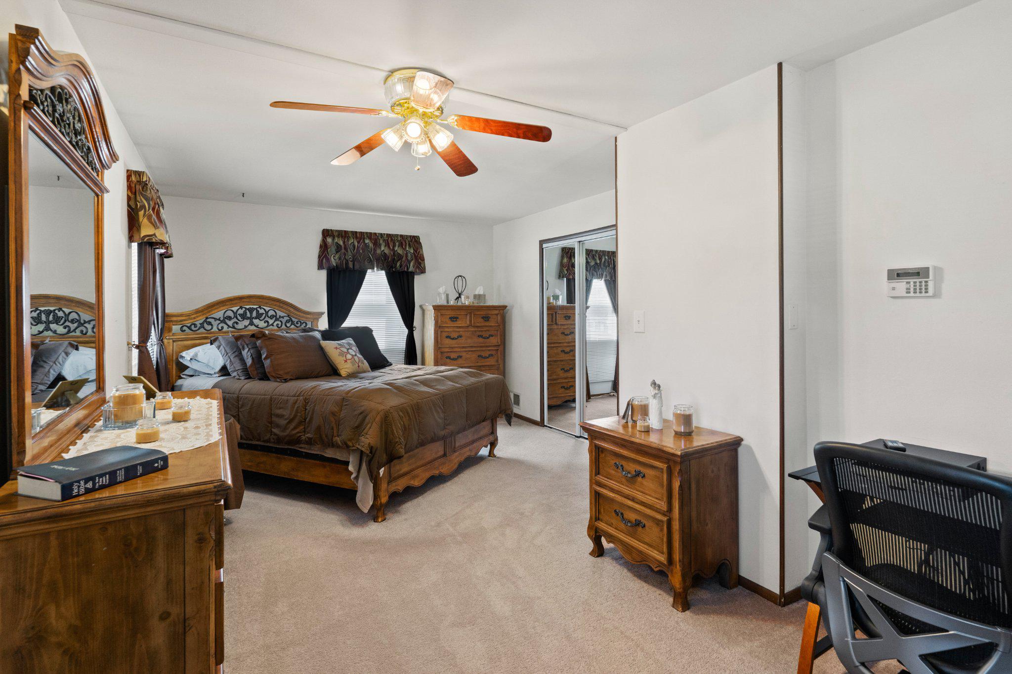 945 Homberg Avenue Baltimore, MD 21221 - Photo 14 of 27 a bedroom with a bed and wooden floor