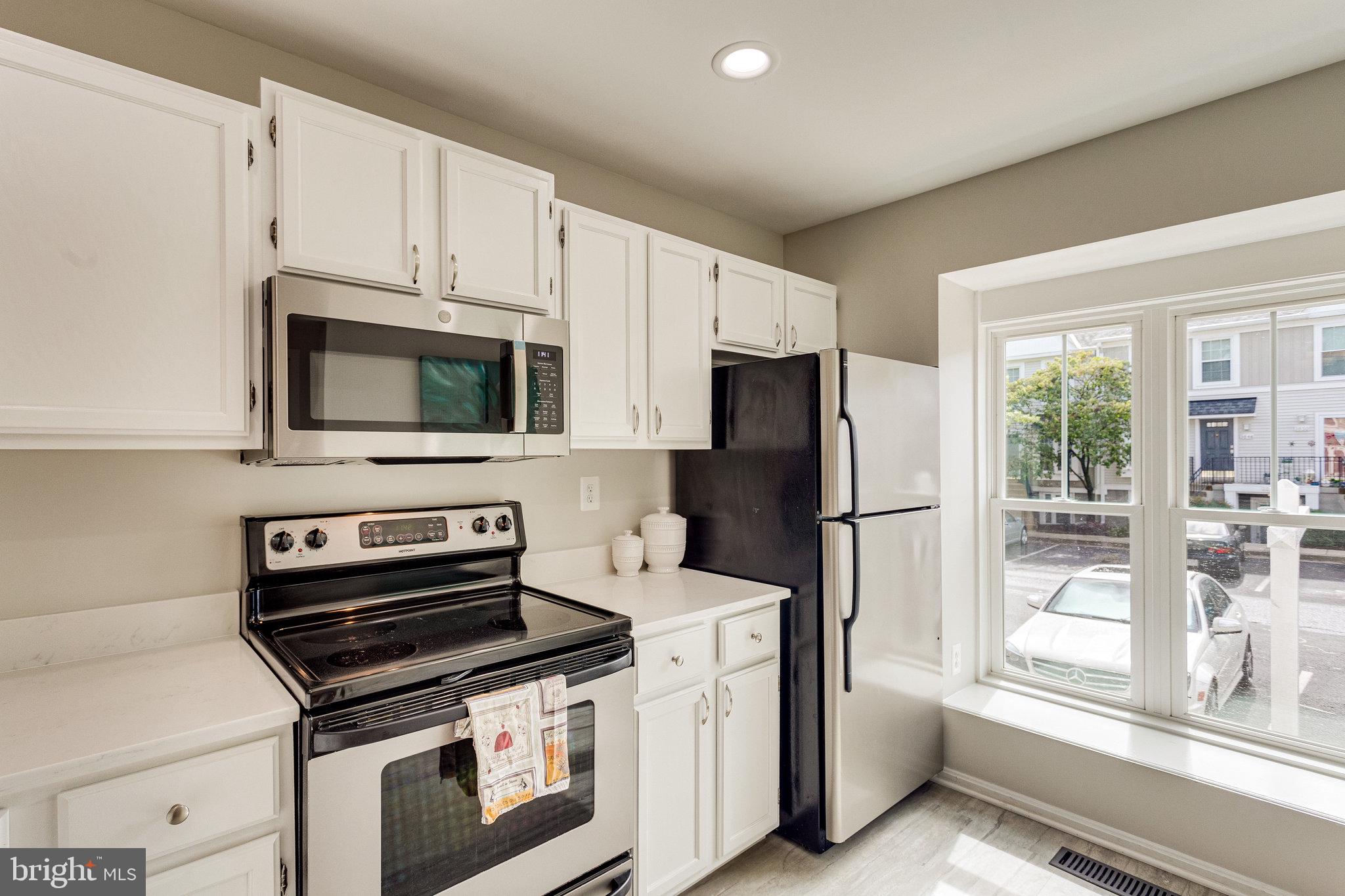 Stainless appliances + huge bay window