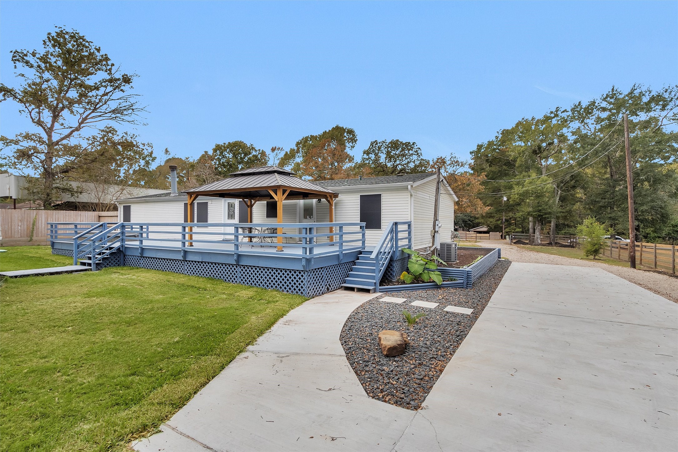 4621 Price Road Montgomery, TX 77316 - Photo 41 of 49 Thoughtful landscaping for easy maintenance