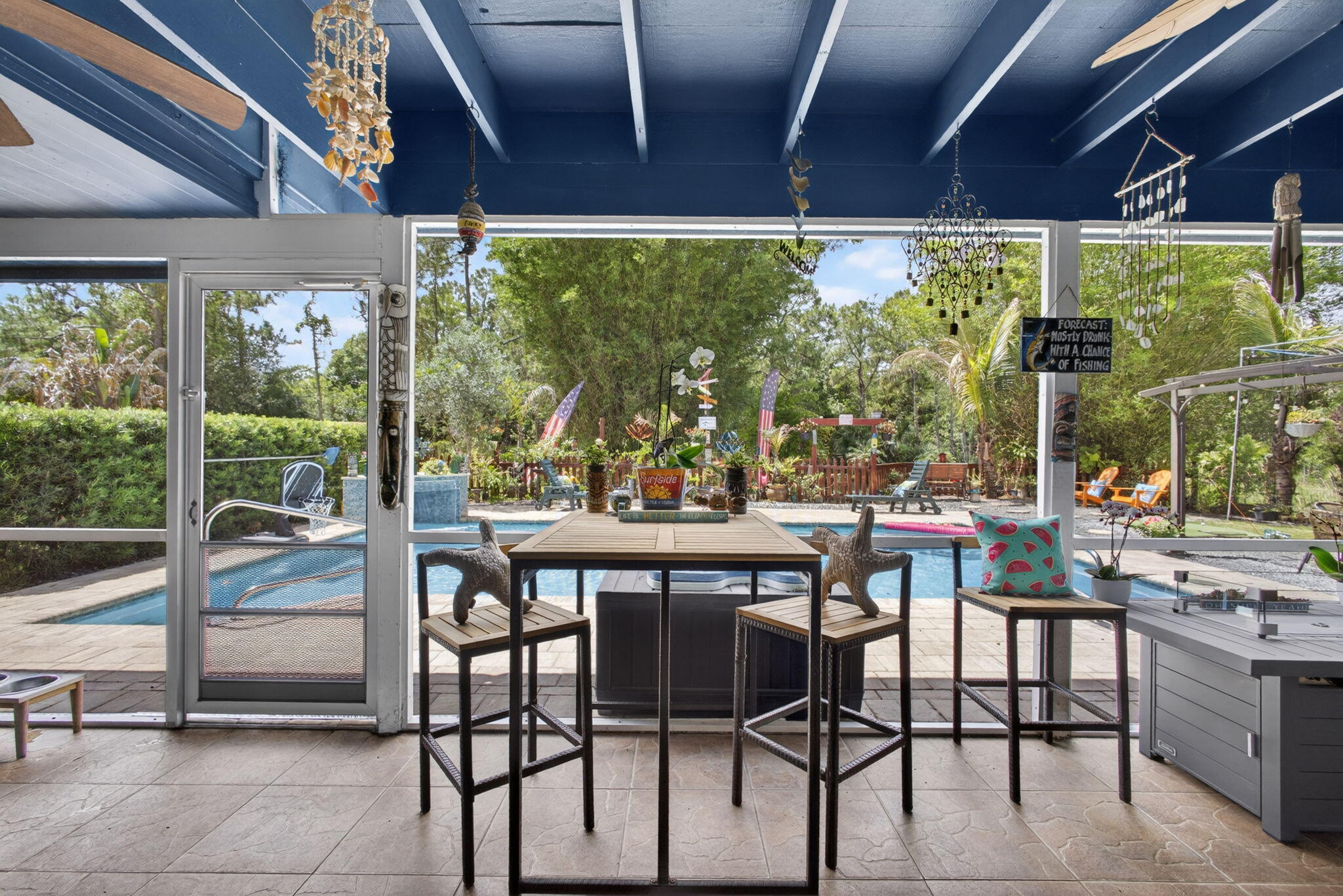 12558 165th Road North Jupiter, FL 33478 - Photo 36 of 67 a view of an outdoor dining space with furniture