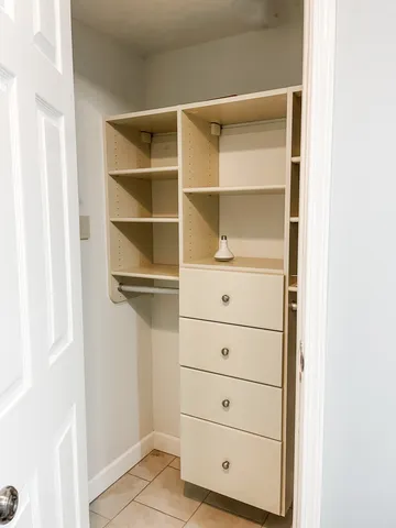 a view of an empty walk in closet