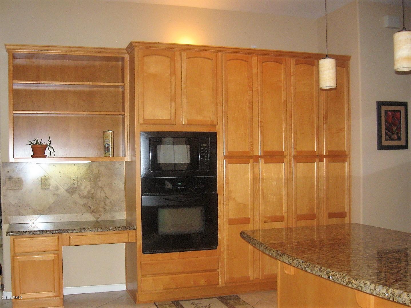 13382 West Coronado Road Goodyear, AZ 85395 - Photo 11 of 35 Built in desk