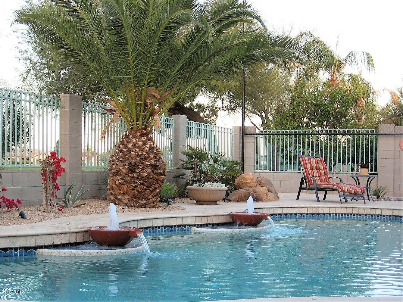 13382 West Coronado Road Goodyear, AZ 85395 - Photo 29 of 35 pool with water features with lights