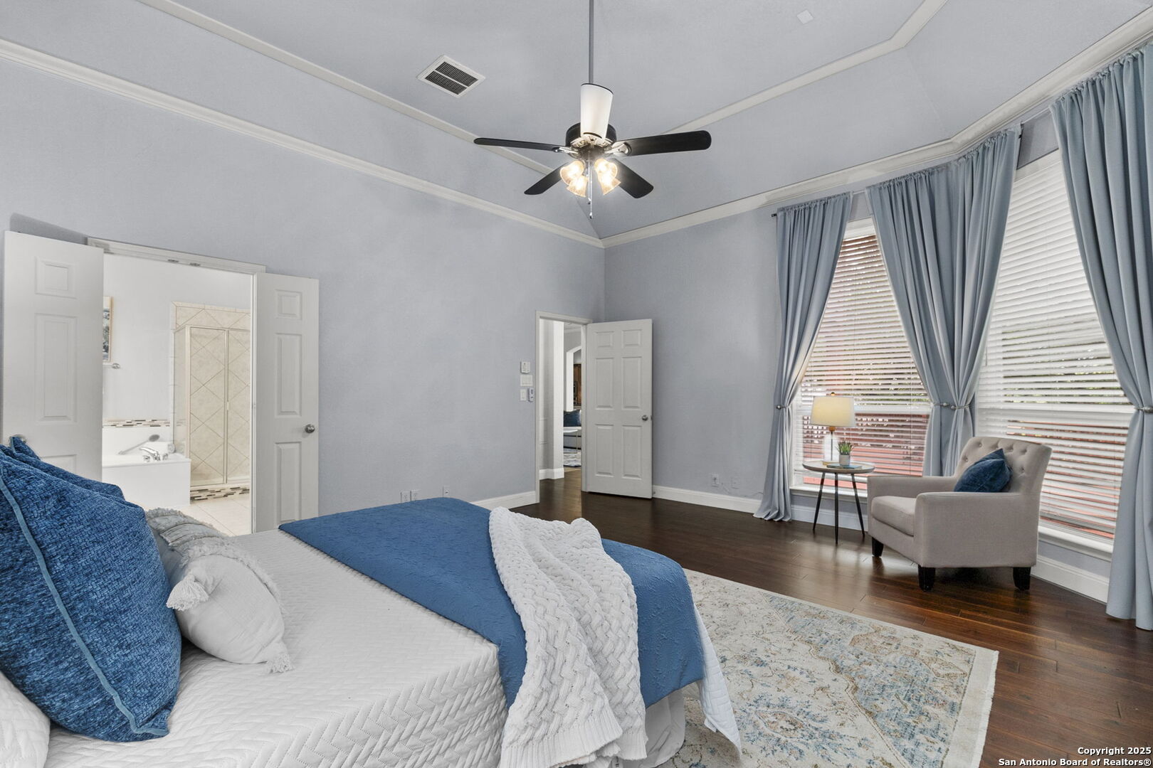 8607 Solano Drive Helotes, TX 78023 - Photo 14 of 30 a bedroom with a bed and a large window