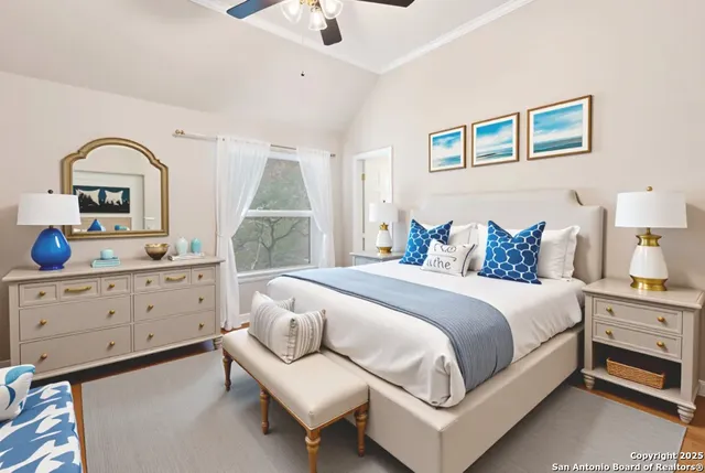 a bedroom with a bed and a dresser