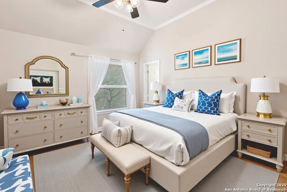 8607 Solano Drive Helotes, TX 78023 - Photo 21 of 30 a bedroom with a bed and a dresser