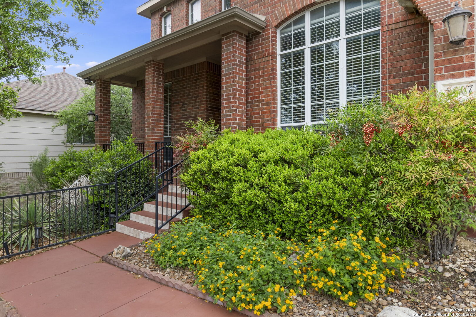 8607 Solano Drive Helotes, TX 78023 - Photo 5 of 30 a front view of a house with a yard