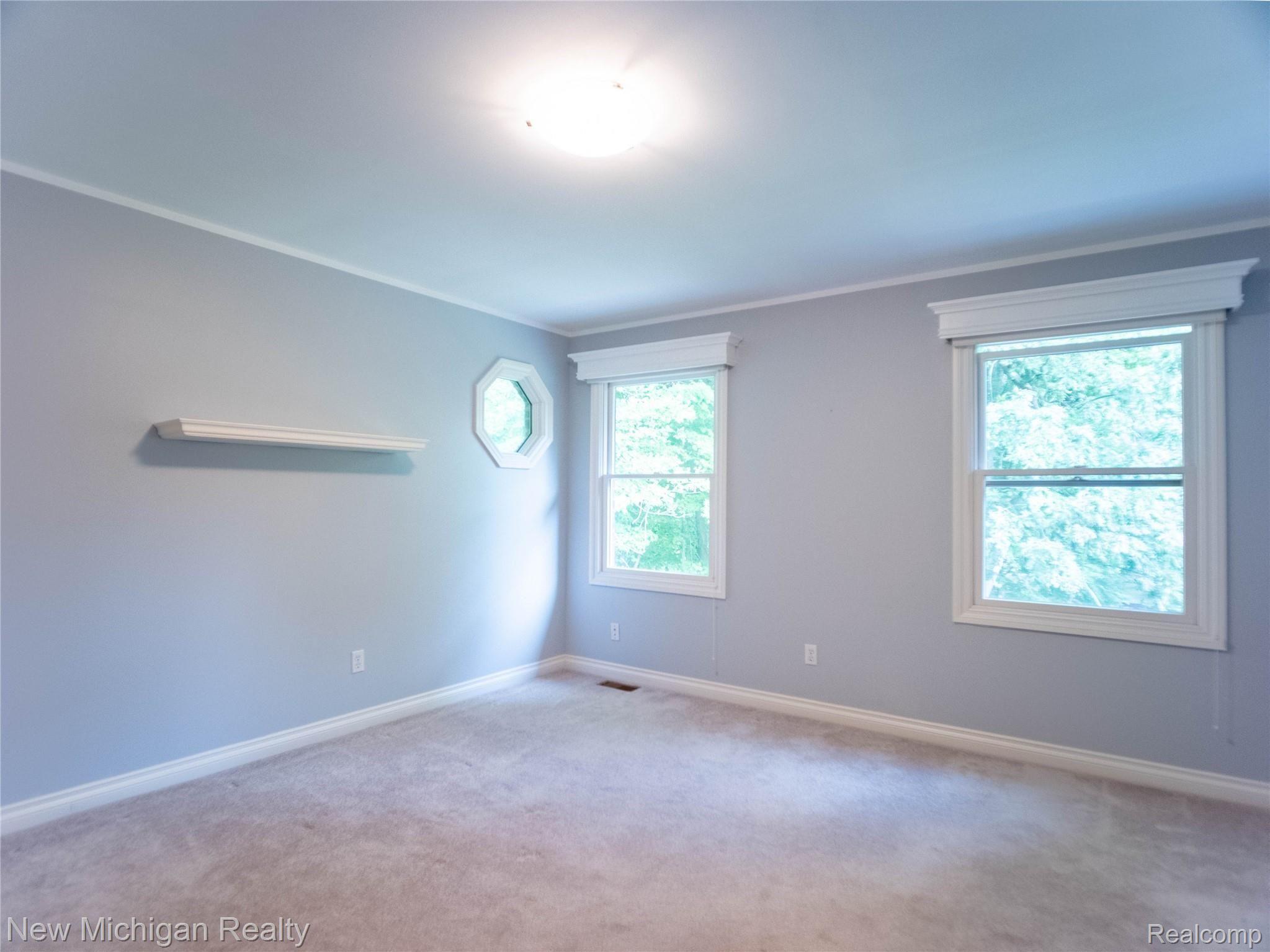 724 Lakeville Road Leonard, MI 48367 - Photo 21 of 31 P1011141-HDR empty bedroom 1.jpg