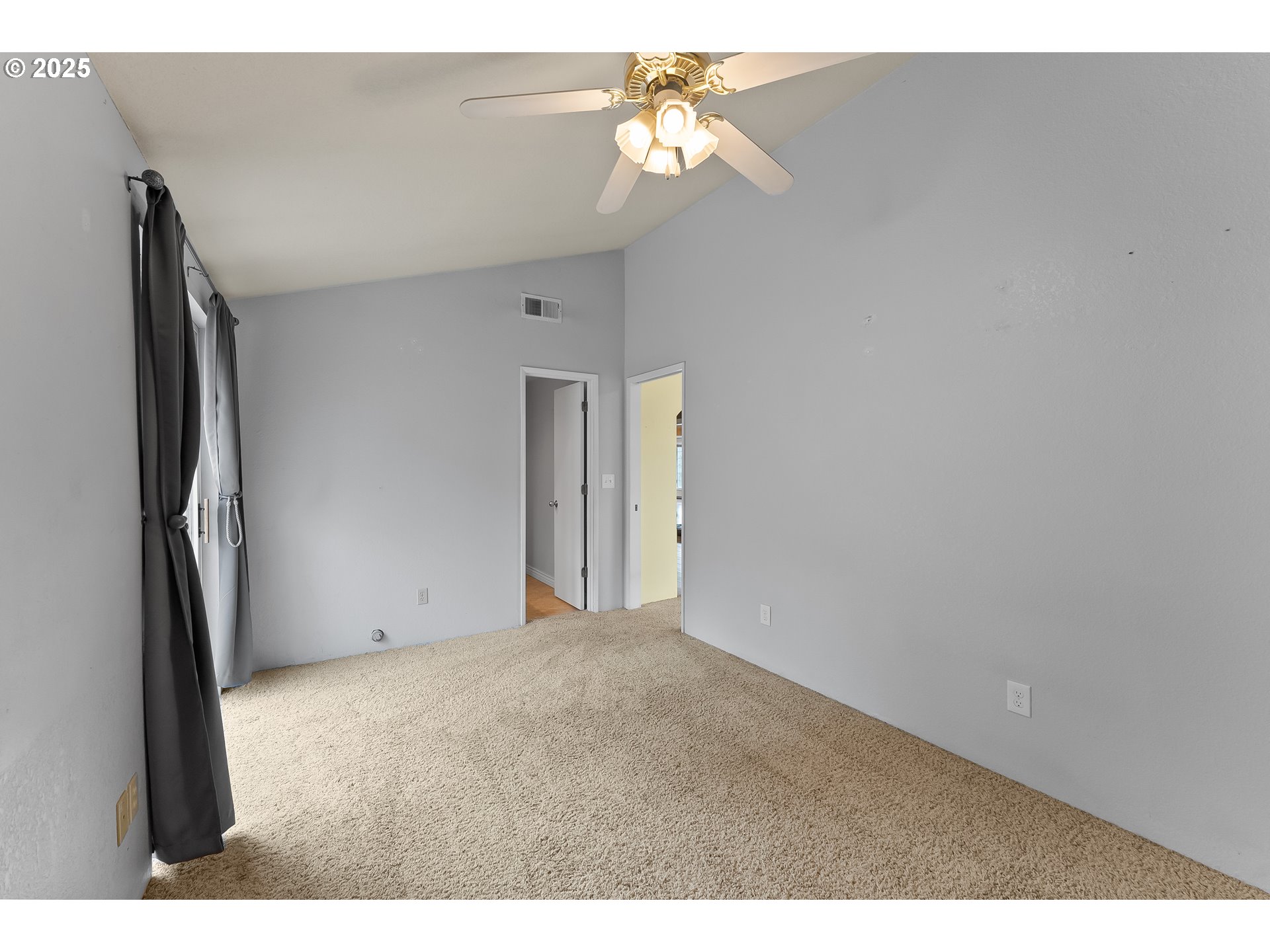 1183 Lookingglass Road Roseburg, OR 97471 - Photo 19 of 47 a view of a big room with chandelier fan