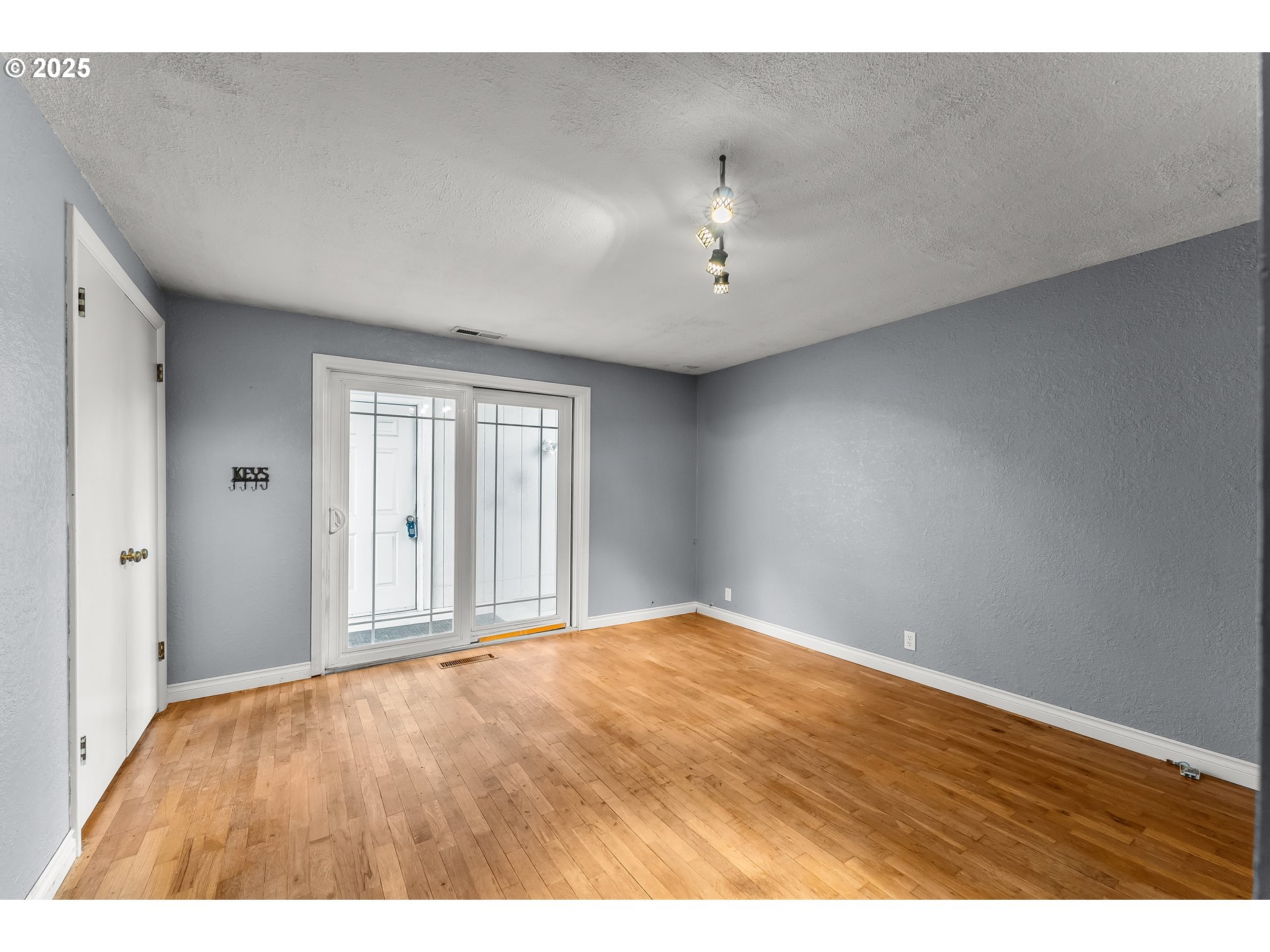 1183 Lookingglass Road Roseburg, OR 97471 - Photo 22 of 47 a view of an empty room with a window