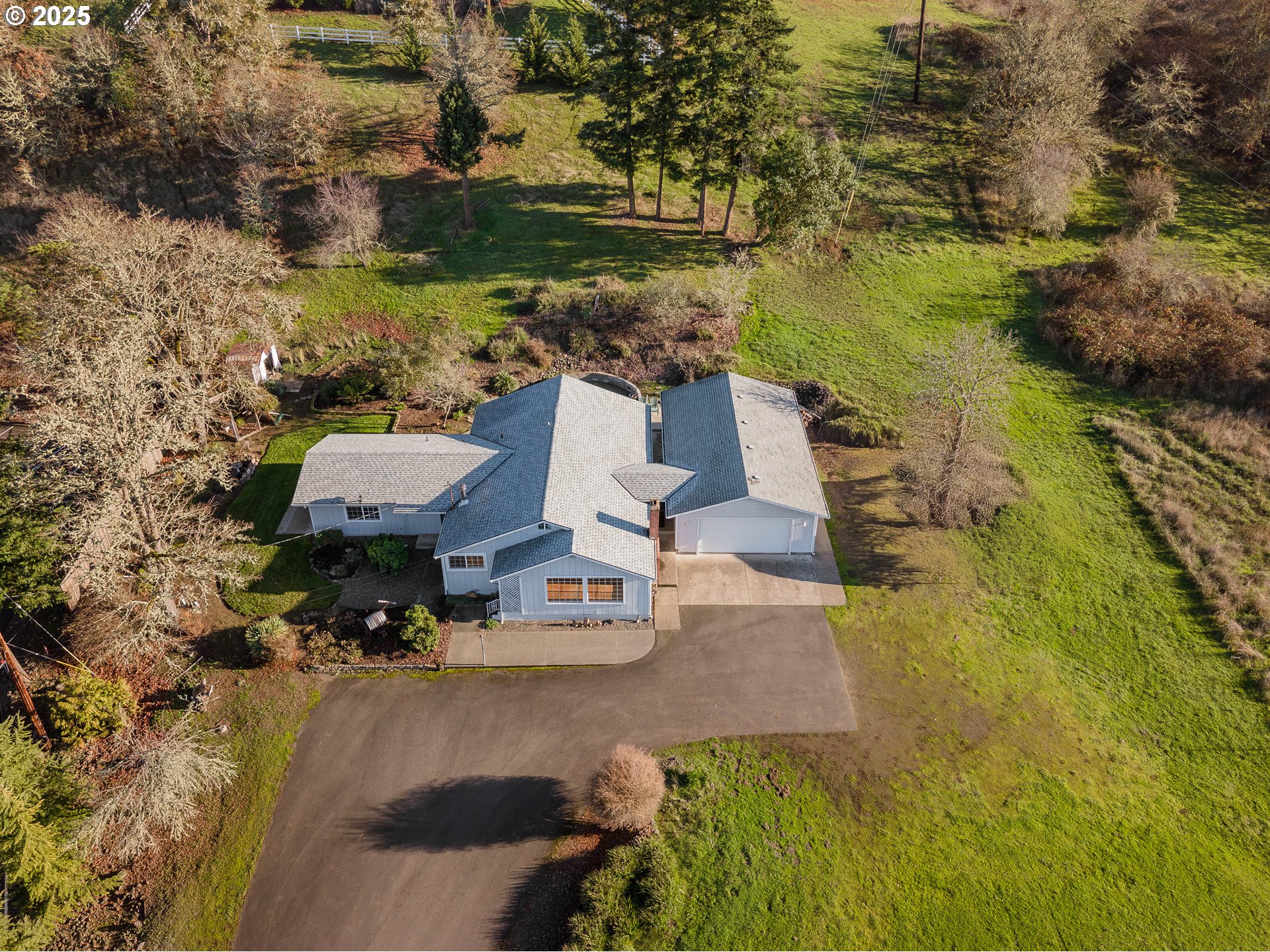 1183 Lookingglass Road Roseburg, OR 97471 - Photo 43 of 47 an aerial view of a house with a yard and lake view