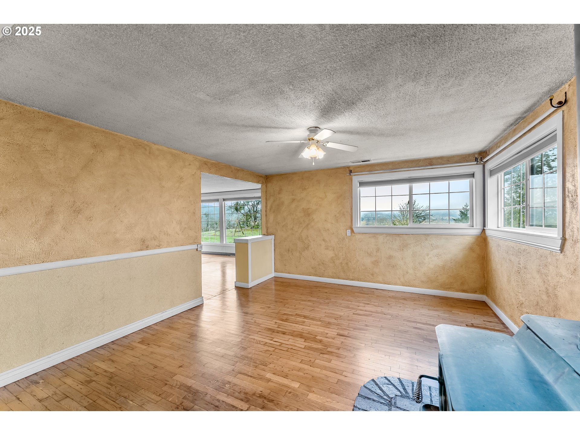 1183 Lookingglass Road Roseburg, OR 97471 - Photo 7 of 47 wooden floor in an empty room with a window