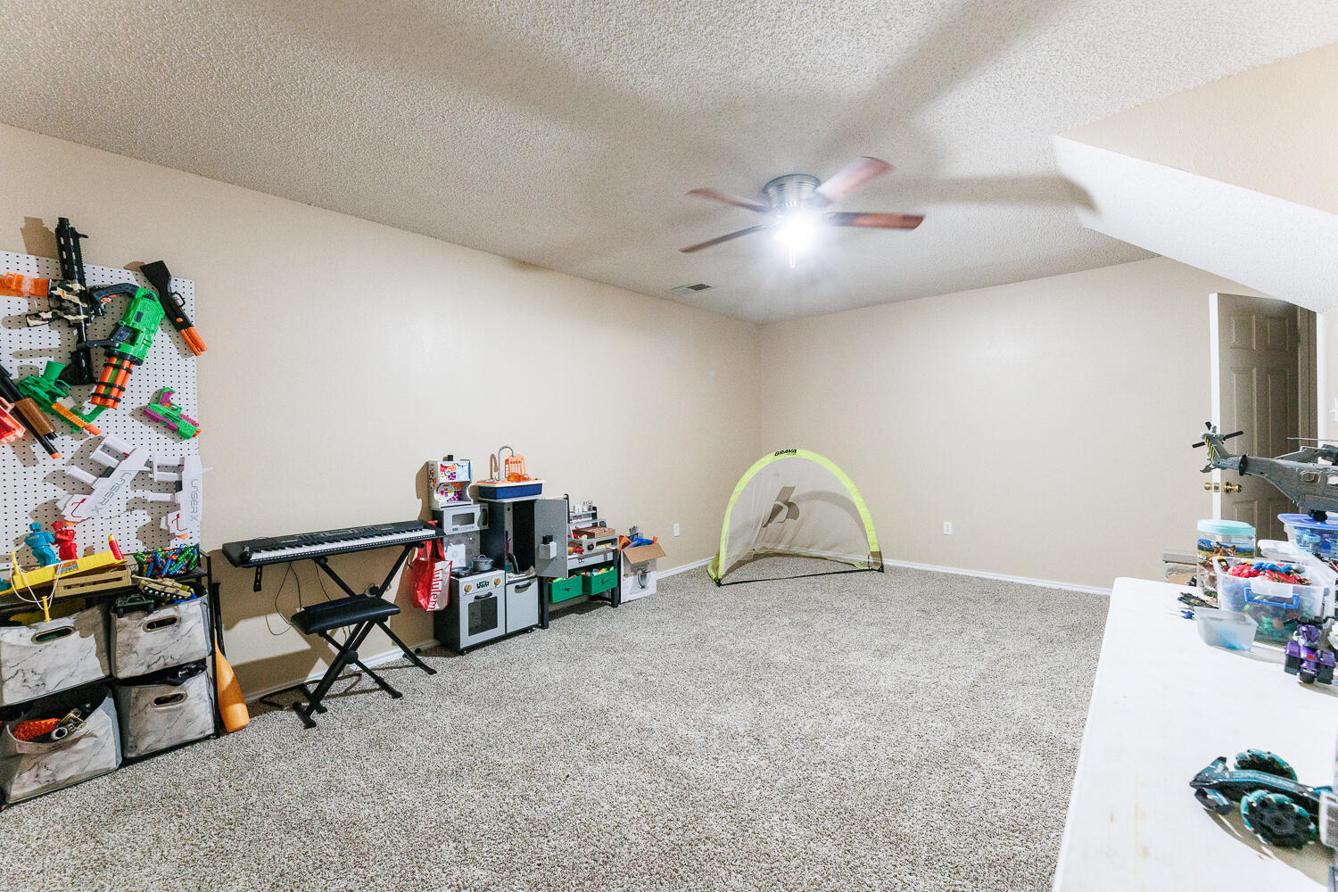 3423 97th Street Lubbock, TX 79423 - Photo 26 of 26 a view of a room with toys