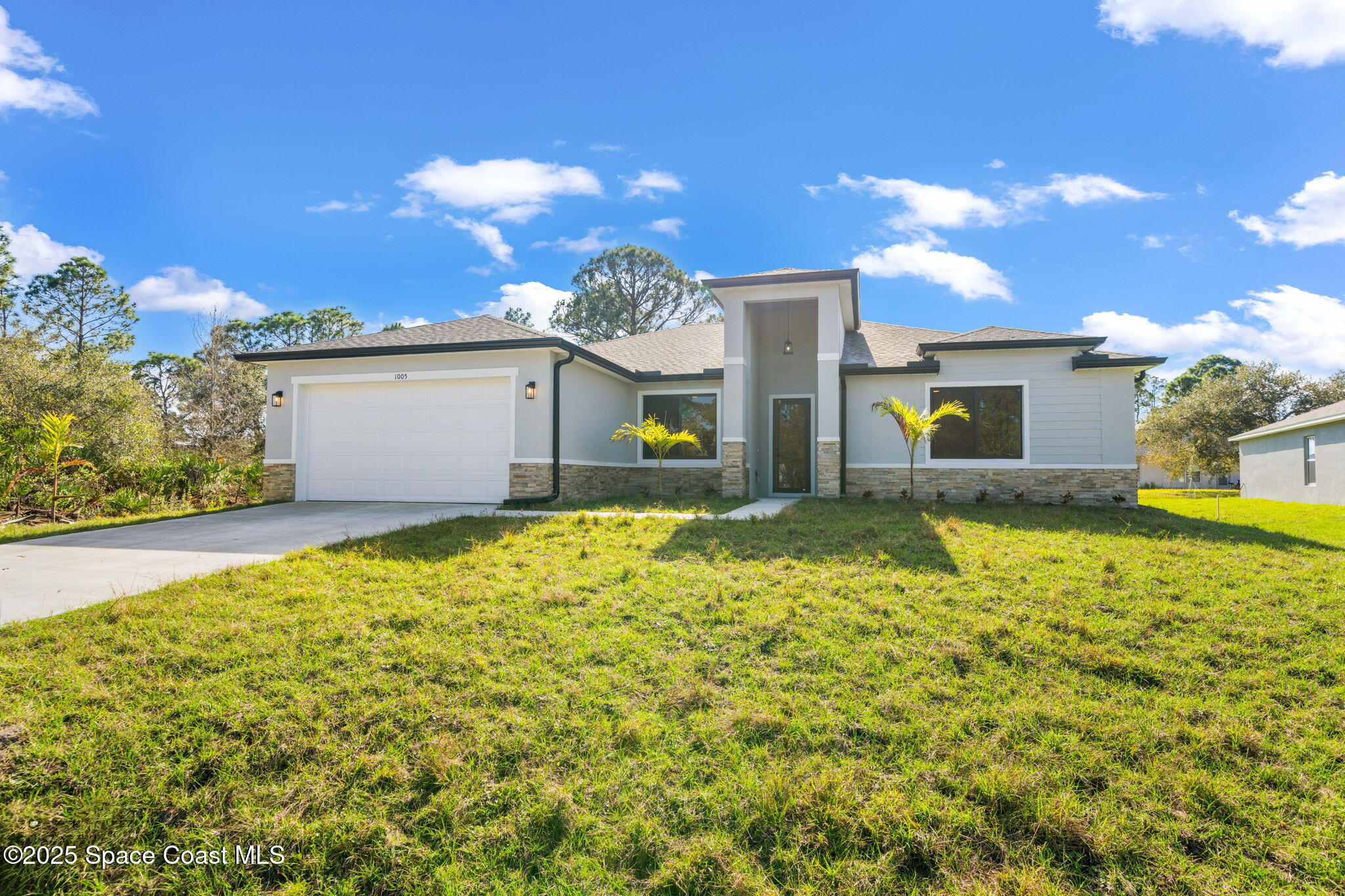 1005 Tide Road Southeast Palm Bay, FL 32909 - Photo 1 of 34 1-web-or-mls-1005-tide-rd-se