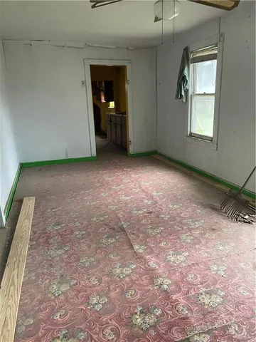 an empty room with windows