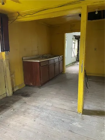 a view of a patio with a yard