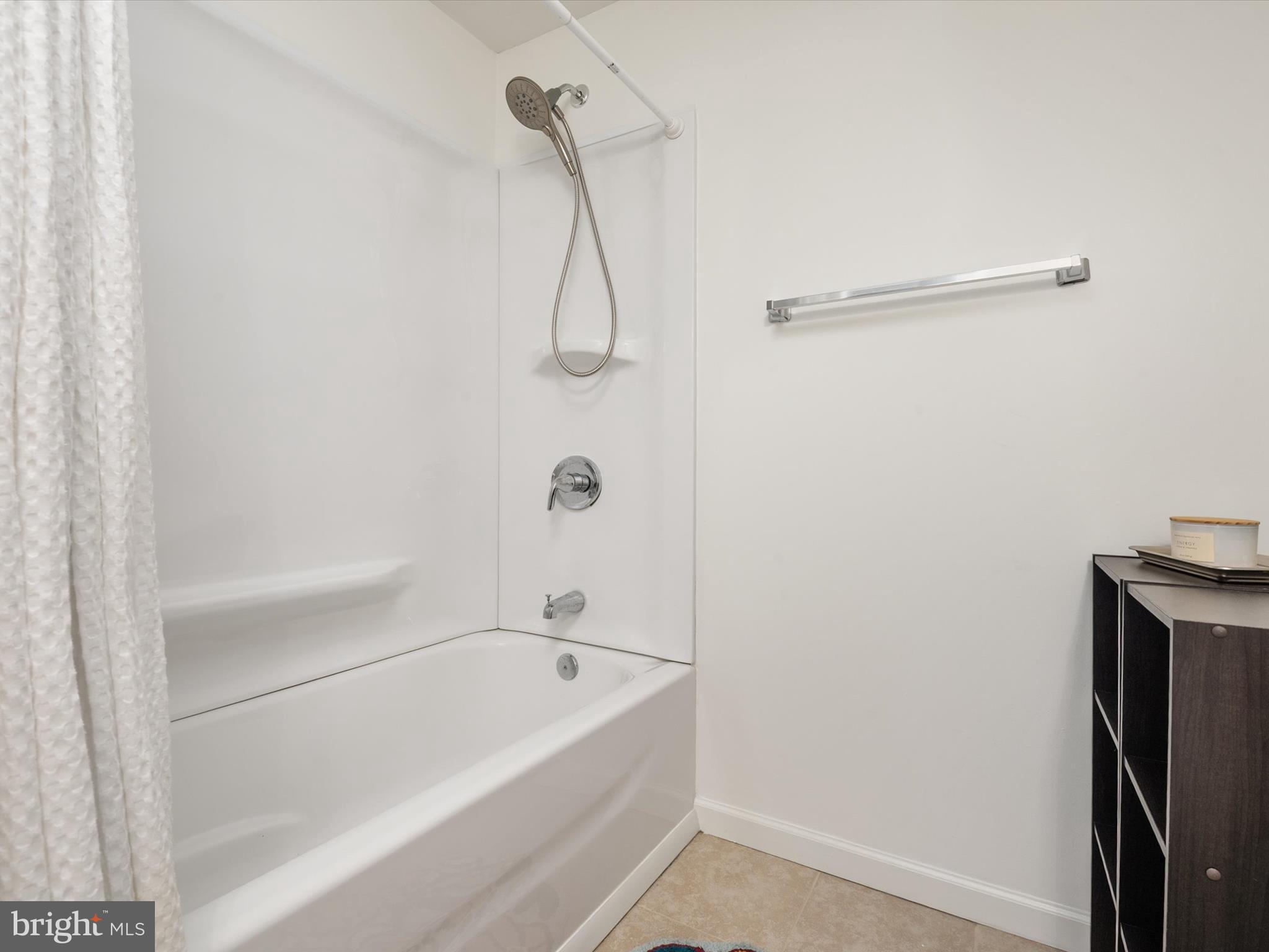 1704 Canal Clipper Court Point of Rocks, MD 21777 - Photo 40 of 75 a bathroom with a bath tub and a shower