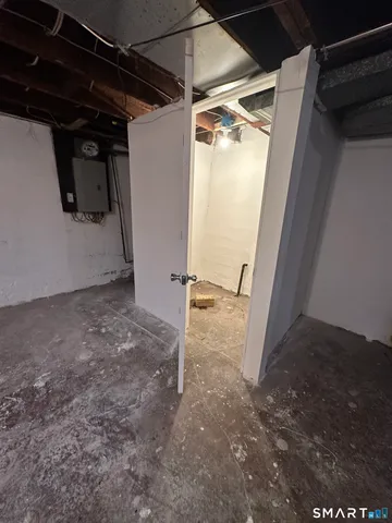 a view of a room with wooden walls