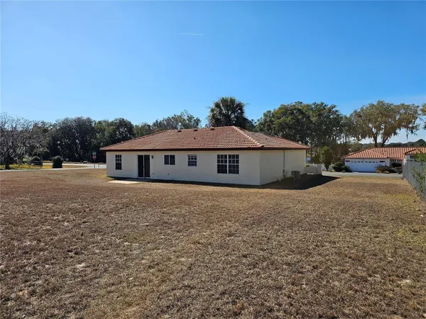 a view of house with outdoor space