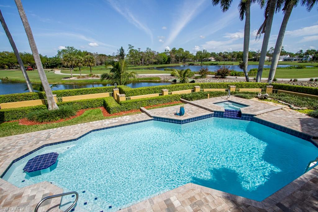 a view of a lake with a yard