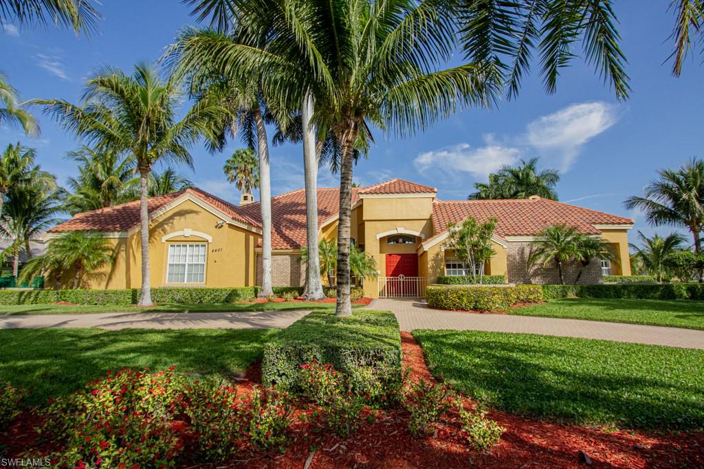 4401 Pond Apple Drive South Naples, FL 34119 - Photo 34 of 35 a front view of house with yard and green space