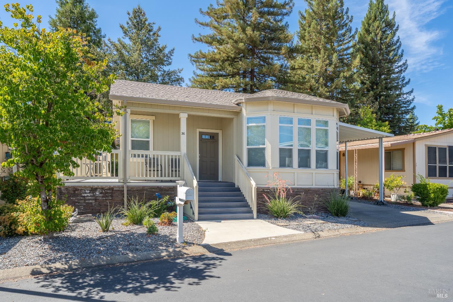36 Blanco Place Ukiah, CA 95482 - Photo 18 of 20 a front view of a house with a garden
