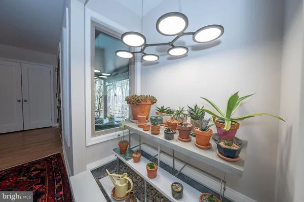 a bedroom with a bed and dresser