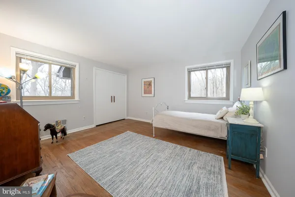 a bathroom with a sink a mirror and a toilet