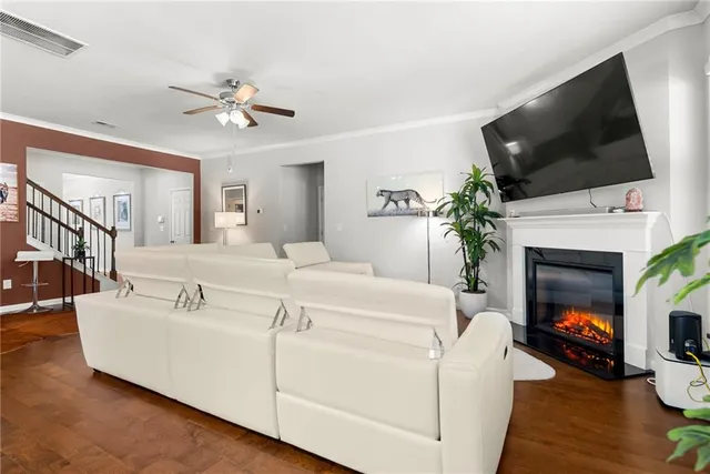 a kitchen with stainless steel appliances granite countertop a stove and a refrigerator