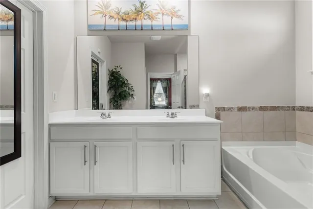 a view of a porch with furniture and a gate