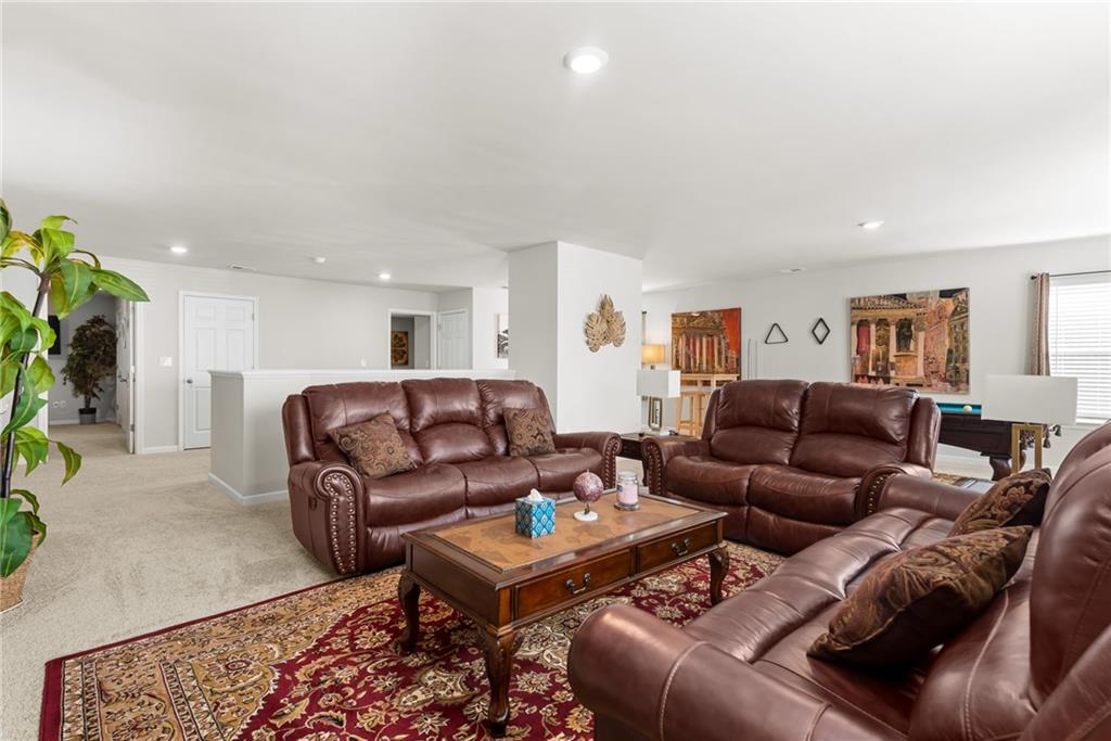 1476 Harlequin Way Stockbridge, GA 30281 - Photo 33 of 57 a living room with furniture