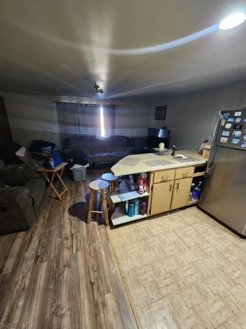 a view of a kitchen with storage and utility