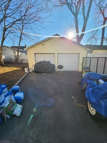 a view of a backyard of the house