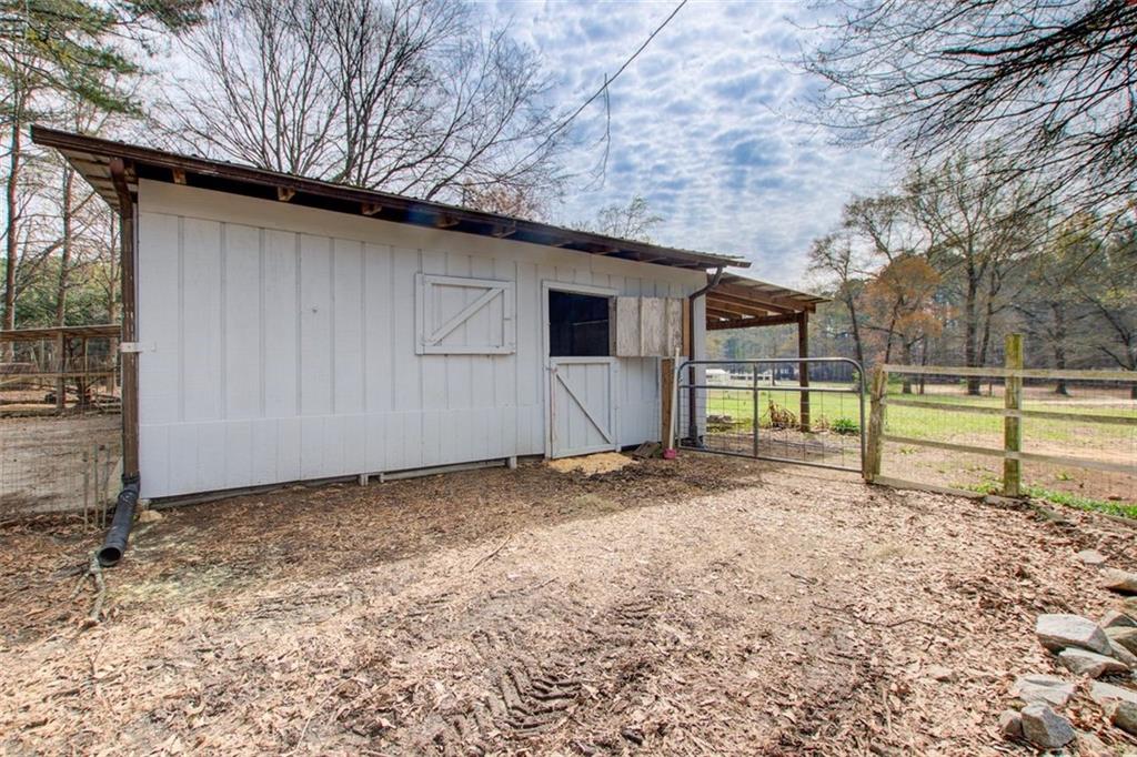 8345 Cleckler Road Palmetto, GA 30268 - Photo 19 of 41 a view of a backyard