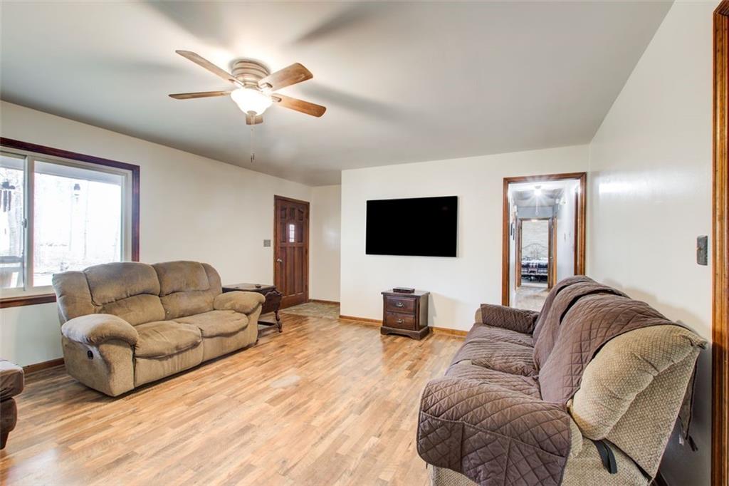 8345 Cleckler Road Palmetto, GA 30268 - Photo 31 of 41 a living room with furniture and a flat screen tv