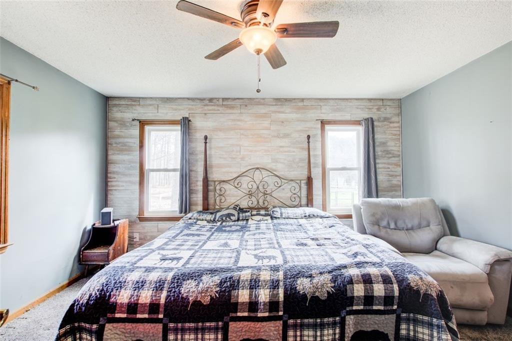 8345 Cleckler Road Palmetto, GA 30268 - Photo 35 of 41 a bedroom with a bed and window