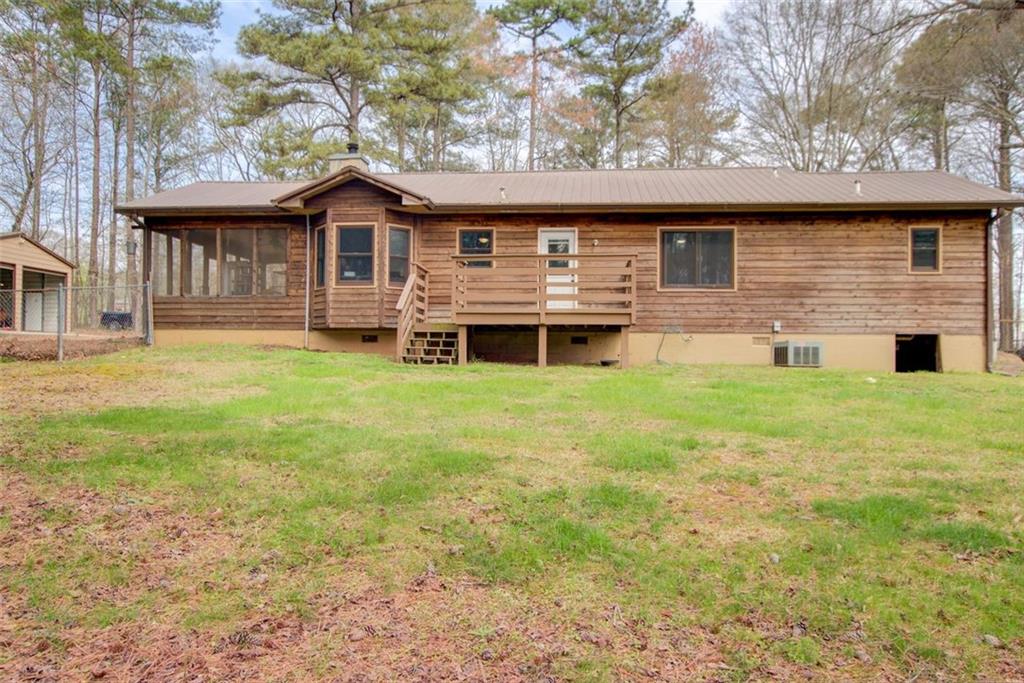 8345 Cleckler Road Palmetto, GA 30268 - Photo 39 of 41 a front view of a house with a yard