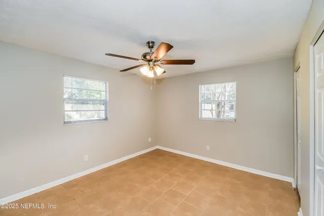a view of a big room with carpet