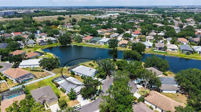 an aerial view of lake residential houses with outdoor space and river