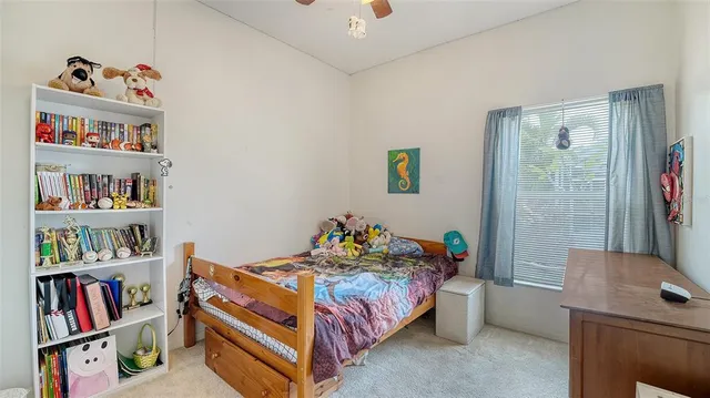 a bathroom with a granite countertop sink toilet mirror and shower