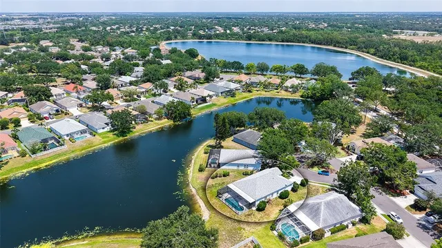 a view of a golf course with a lake