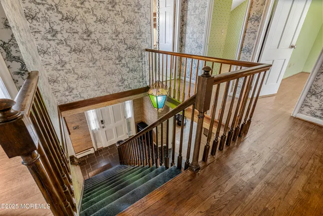 a view of stairs and a balcony